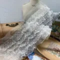 Detail view of 15cm white 5-layer polka dot mesh ruffled lace trim for DIY doll clothes. - 15cm / White