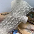 White dotted mesh lace ruffle trim close-up, multi-layer sheer fabric detail for DIY sewing. - 15cm / Beige