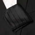 Detailed view of men's black striped pocket square, elegant fabric texture for formal suit styling. - Black Hidden Stripe Style