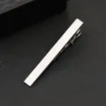 Silver tie clip detail shot featuring brushed metal finish and sleek minimalist bar design. - Fine Brushed Bar Style (J102)