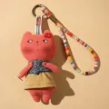 Handmade fabric cat keychain with colorful woven strap, cute plush doll bag charm pendant. - Red Cat