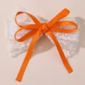 Schattige kanten haarstrik met helder oranje lint voor lieve meisjes en dagelijks gebruik thuis. - Oranje
