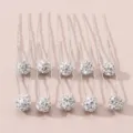 Elegante U-vormige haarspelden met dubbele strass-ballen, ideaal voor chique haarstylings. - Wit