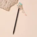 Traditionele antieke haarspeld met bloemen vlinder ontwerp en kwastje, ideaal hanfu cadeau. - Zwart