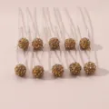 Detailed view of sparkle rhinestone ball U-shaped hair pins, elegant hair styling accessories. - Khaki