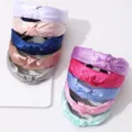 Detailed shot of solid color satin knotted headbands, smooth fabric texture and neat arrangement. - SMH1382 Combo