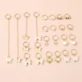 Gold hair rings set with butterfly bow star charms, dreadlock cuffs for stylish girl hair decor. - Gold