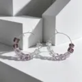 Detailed close-up of gradient purple and clear cube beaded hoop earrings with silver finish. - Pink Purple Beaded Hoop