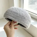 Detailed view of the pleated grey polka dot wide headband, showing texture and high shape. - Grey Polka Dot Wide Headband / Gray