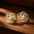 Handmade woven flower stud earrings, elegant hollow floral design, chic resort style accessory. - Off White