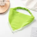 Green triangle hair scarf with white lace trim and elastic band, stylish women hair accessory detail. - Verdant