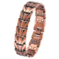 Vintage copper magnetic bracelet with detailed dragon pattern links and secure clasp design. - Bronze