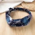 Close-up detail of blue and white leaf print cross fabric headband, ideal for summer wear. - Blue Tie Dye