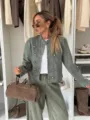 Detail view of the stylish army green military style button-decorated jacket and matching pants. - S / Tops / Army Green