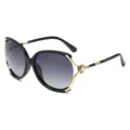 Occhiali da sole oversize neri da donna con metallo dorato, perle e protezione UV. - Montatura Oro Nero Lente Sfumata Grigia