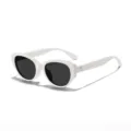 Occhiali da sole cat-eye rétro bianchi da donna, protezione UV e stile vintage alla moda. - Bianco