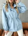 Women's waterproof hooded windbreaker jacket with drawstring waist for autumn casual wear. - Light Blue