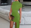 Detail view of the elegant summer sleeveless ruched asymmetric bodycon dress for women fashion. - Green