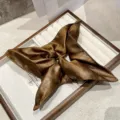 Premium brown leather scrunchie hair accessory, stylish star shape design for chic ponytails. - Coffee