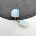 Close-up detail of white crystal square and rectangular pendant charms for DIY jewelry. - Synthetic Opal (1 Piece)