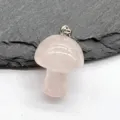 Natural rose quartz crystal mushroom pendant detail shot showing delicate stone carving and polished finish. - Rose Quartz (1 Piece)