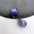 Blue natural stone crystal irregular pendant close-up detail showcasing unique texture and metal bail. - Blue Spot Jasper (1 Piece)