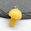 Yellow crystal mini mushroom pendant detail view, delicate gemstone carving charm. - Yellow Beeswax Amber