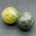 Natural crystal ball mineral specimen detail view, polished healing stone sphere decor. - Moss Agate