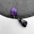 Natural amethyst crystal irregular pendant close-up, polished stone necklace accessory detail view. - Amethyst (1 Piece)
