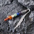 Metal feather bookmark with 7 chakra crystal gemstone beads for reading lovers detail view. - Round Bead Style