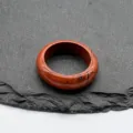 Natural red jasper stone ring close-up detail shot, smooth round gemstone finger ring jewelry. - 18-20mm Inner Diameter / Red Jasper