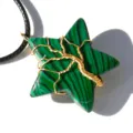Close-up detail of green crystal star pendant with gold wire tree of life wrap necklace. - Synthetic Malachite