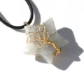 Natural crystal star pendant with wire wrapped tree of life design and black cord necklace. - Labradorite