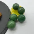 Polished dark green stone crystal spheres detail, smooth surface, decorative ornament. - 25mm / Green Aventurine