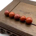 Red jasper gemstone loose beads detail, smooth round undrilled stone for DIY jewelry making. - Red Jasper
