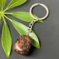 Natural gemstone tumbled stone keychain with stainless steel ring and polished crystal charm. - 15-20mm Tumbled Stone / Golden Swan Quartz Keychain