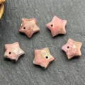 Faceted pink star stone pendant detail shot, drilled star bead component for DIY jewelry making. - Rhodonite