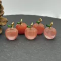Detail view of pink crystal apple pendant with gold bail for DIY jewelry necklaces earrings. - Synthetic Watermelon Red