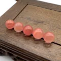 Pink crystal gemstone sphere close up, smooth round bead for DIY jewelry making accessories. - Watermelon Red (Synthetic)