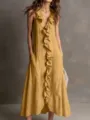 Close-up detail of the sleeveless ruffle maxi dress featuring a V-neck and pockets. - S / Dresses / Yellow