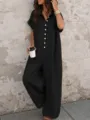 Détail de combinaison noire d'été à manches courtes et boutons, tenue élégante. - XS / Combinaisons / Noir
