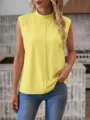 Detail shot of the yellow sleeveless mock neck top showcasing the front seam and fit. - S / Tops / Yellow
