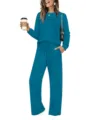 Detail view of the casual teal long-sleeve sweatshirt and matching trousers lounge set. - Malachite green