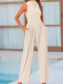 Beige sleeveless wide-leg jumpsuit detail showing relaxed fit, waist cinch, and handy side pockets. - Off White
