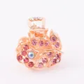 Small golden metal hair claw clip adorned with sparkling pink rhinestones and a central crystal. - CH004 / Rose Red