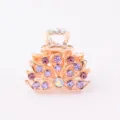 Small rhinestone hair claw clip, rose gold metal finish with sparkling purple crystals. - CH005 / Purple
