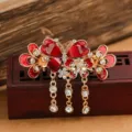Vintage red butterfly hair claw clip with rhinestones and tassel details for elegant styling. - Butterfly Tassel Hair Claw / Red