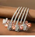 Close-up detail of silver rhinestone hair comb featuring amber crystals and delicate clear stones. - CHY79 Champagne (Silver) Butterfly