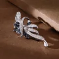 Elegant silver rhinestone crystal brooch, blue stone flower lapel pin for women suit. - Electroplated Silver Blue