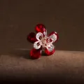 Compact metal flower hair claw clip adorned with sparkling red rhinestones for chic updos. - TS123 Red